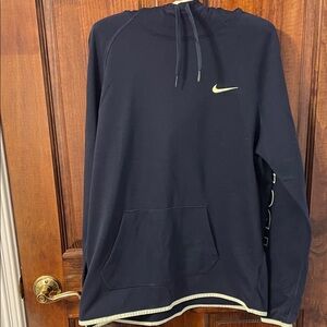 Nike Women’s Navy Blue Hoodie with Yellow Logo.